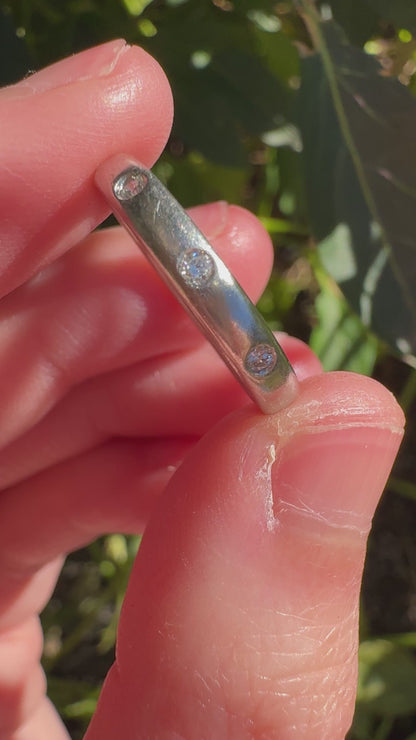 Vintage platinum three stone round brilliant cut diamond gypsy ring