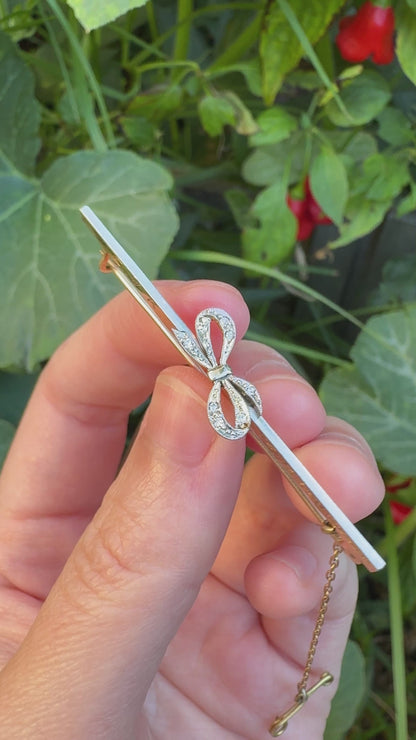 Vintage Art Deco 15ct yellow gold and platinum diamond bow bar brooch/chain extender with safety chain