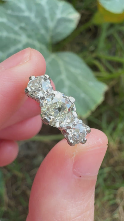 Antique 18ct yellow gold three stone 1.56ct TCW old mine cut diamond ring