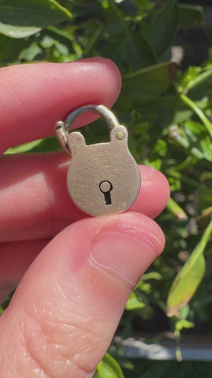 Antique 9ct rose gold padlock pendant