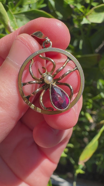 Antique 9ct yellow gold 0.6ct garnet and pearl spider pendant