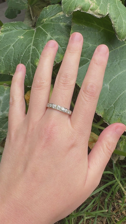 Vintage platinum 0.7ct TCW old mine cut diamond engraved half eternity ring