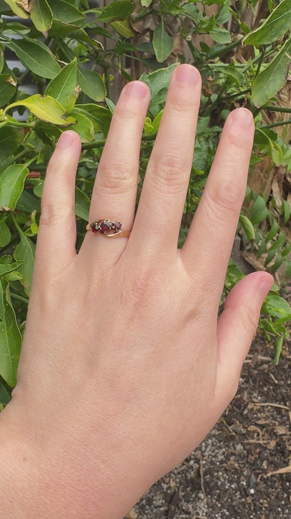Antique Australian 18ct yellow gold three stone 0.46ct TCW garnet crossover ring